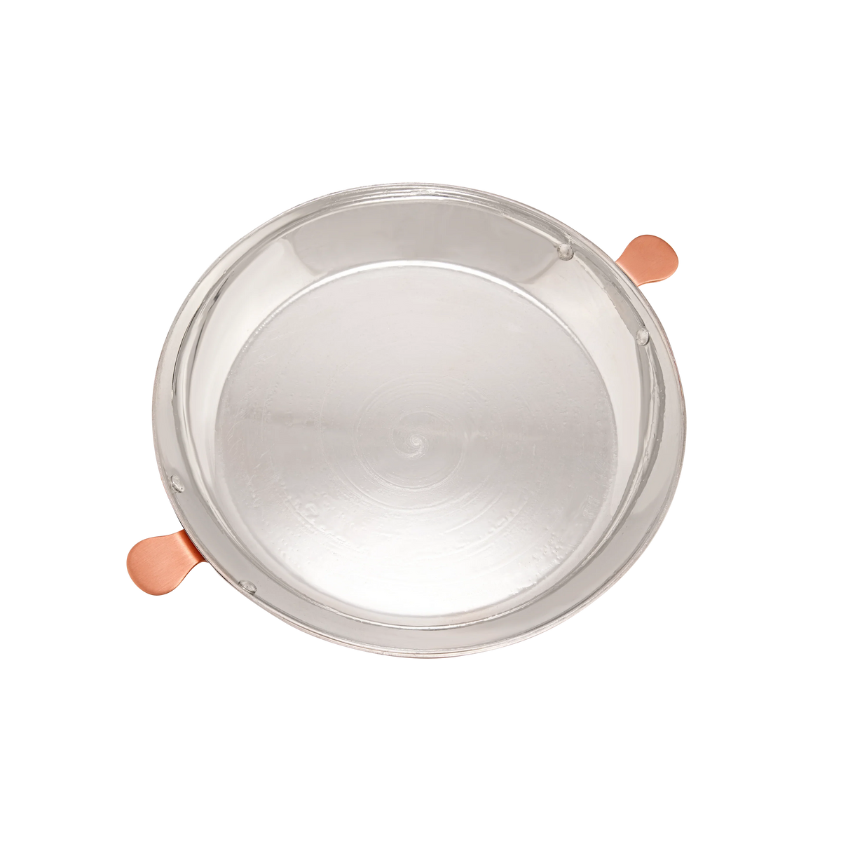 Top-down view of a polished stainless steel pan with two copper-colored handles.