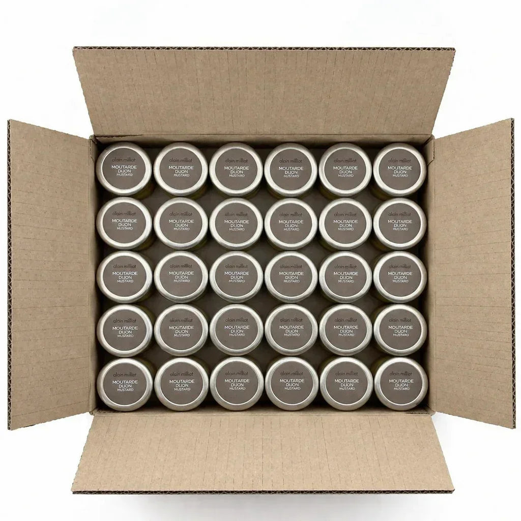 Alain Milliat Dijon mustard jars neatly packed in a cardboard box, artisan-made and premium quality.