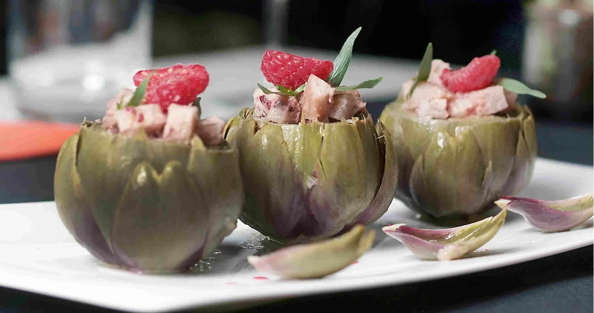 Stuffed artichokes with raspberry garnish, artisan-made, premium quality