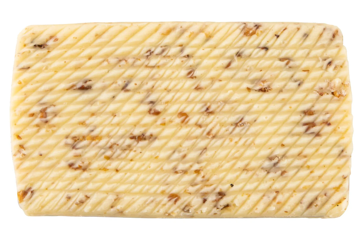 Bordier buckwheat butter block with ridged texture and toasted buckwheat inclusions, hand-churned French butter