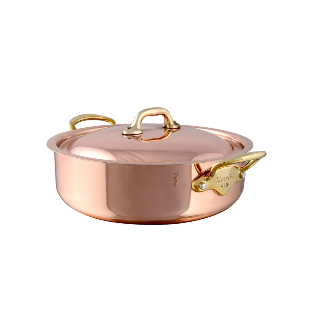Mauviel 1830 copper sauté pan with lid and gold-toned handles.