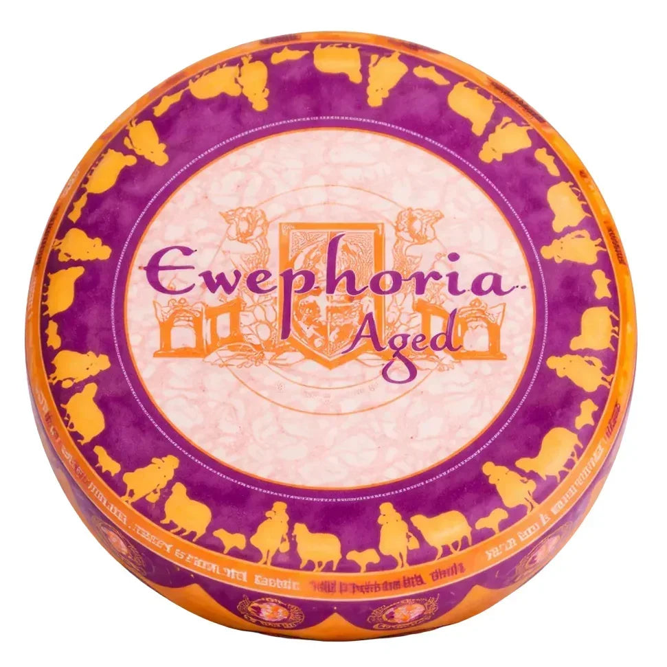 Ewephoria Aged artisan cheese wheel with purple and gold farm animal design, premium French dairy