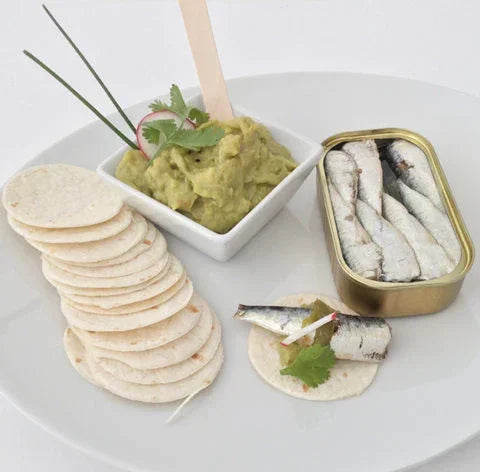 Artisan sardines with guacamole and tortilla chips, premium French pantry items