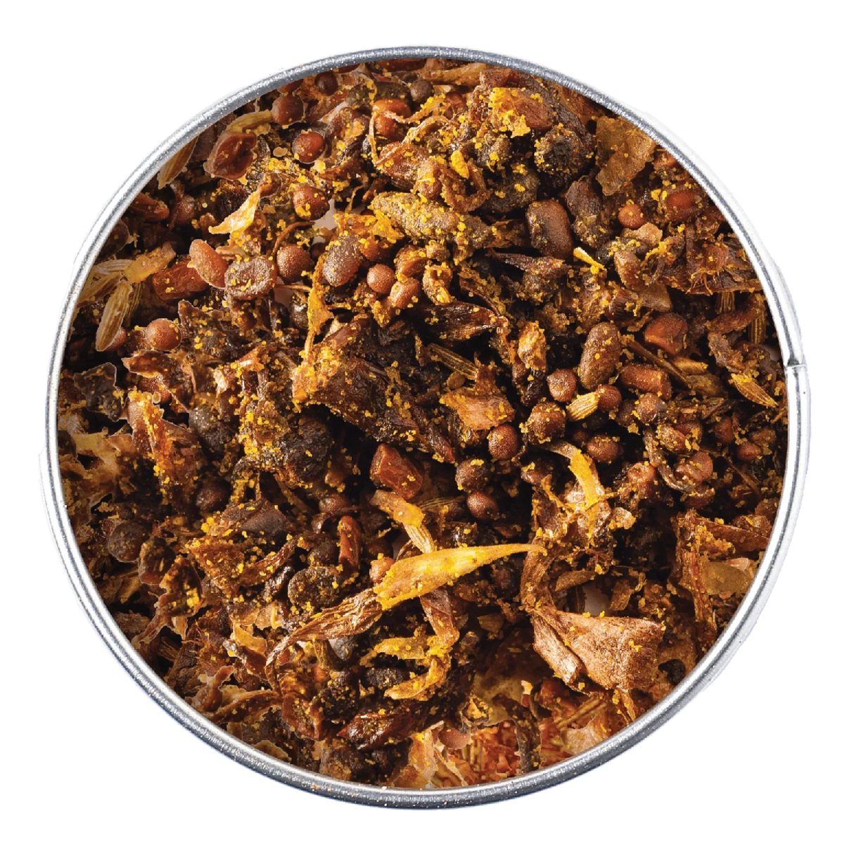 Artisan Indian spice blend with whole peppercorns, dried herbs, and turmeric in a metal tin