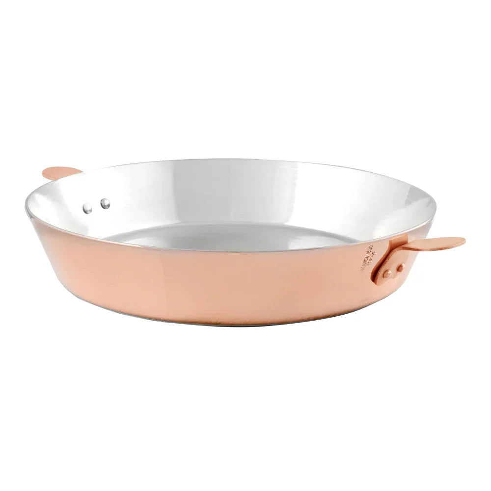 Copper-colored shallow metal pan with two small handles on a white background.