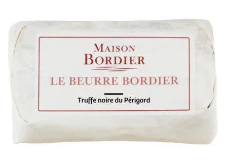 French truffle butter wrapped in paper, labeled Maison Bordier Le Beurre Bordier