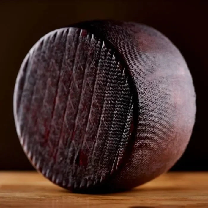 Artisan Spanish cheese wheel with textured rind, premium quality, all-natural, gluten-free