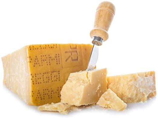 Artisanal hard cheese wheel with wooden cheese knife, premium aged cheese chunks, natural rind