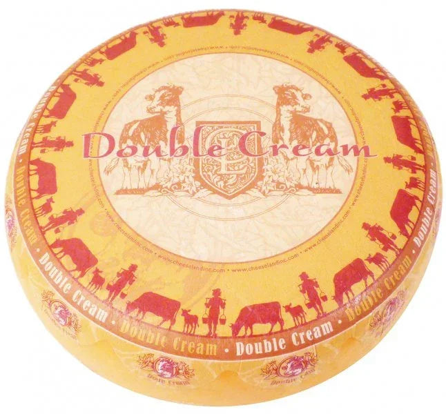 Double Cream cheese wheel with cow illustrations, artisan-made and premium quality