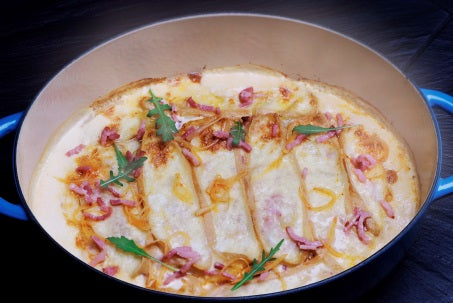 Breizhiflette, a Breton potato and bacon gratin baked under a halved Curé Nantais cheese