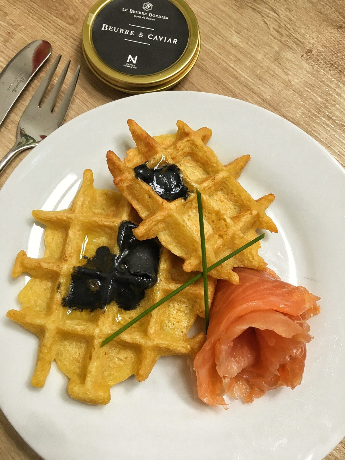 Crisp potato waffles topped with smoked salmon, chives and a melting dab of Bordier butter