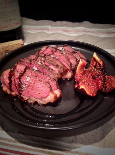 Sliced duck breast with roasted figs and a balsamic sauce made with Bordier chocolate and cacao nib butter