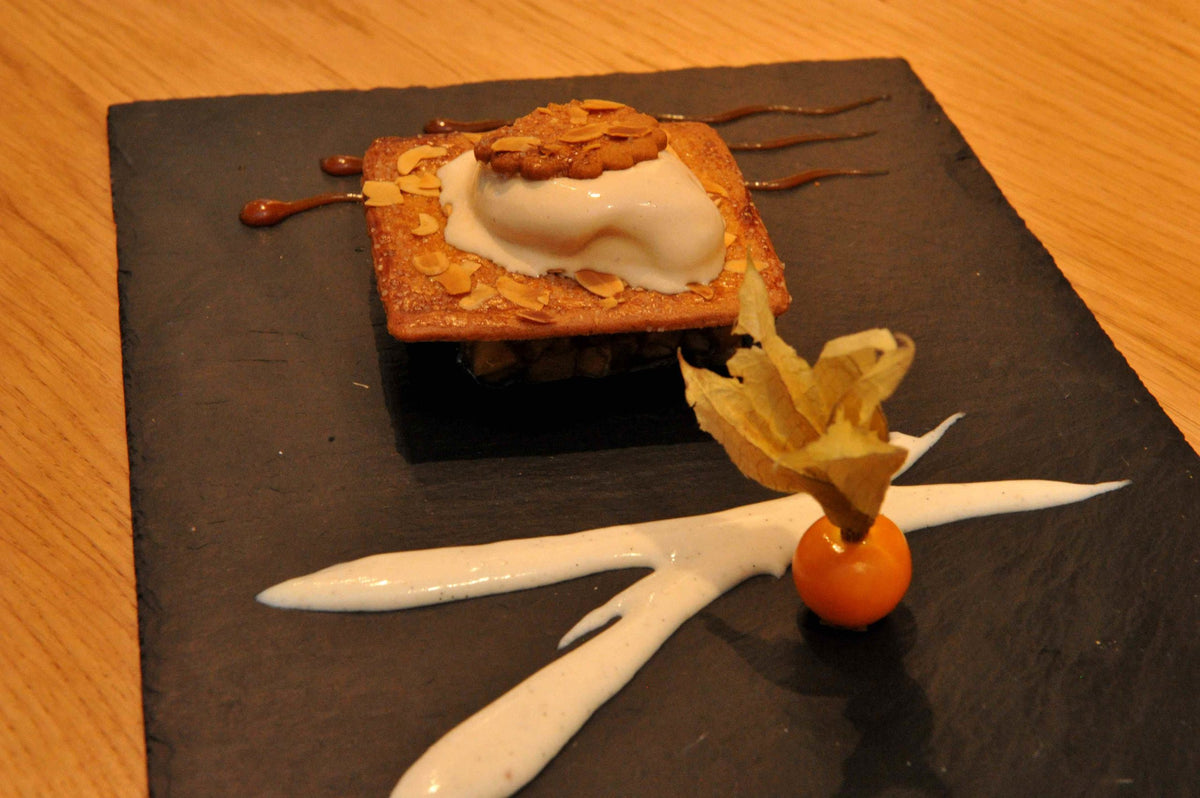Petit beurre biscuit layered with caramelized apples, ice cream and Bordier Madagascar vanilla butter