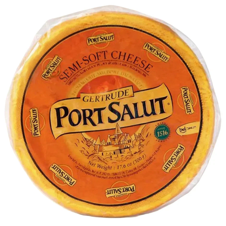 Round wheel of Port Salut semi-soft French cheese in orange packaging