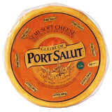 Round wheel of Port Salut semi-soft French cheese in orange packaging