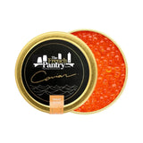 Premium farmed trout caviar in a gold tin container.