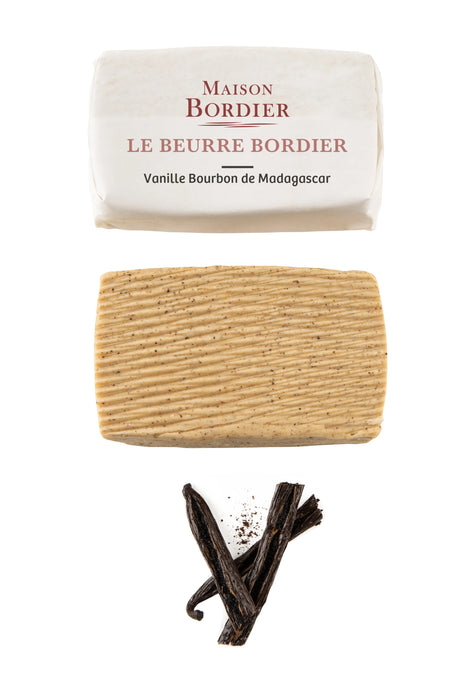 Maison Bordier vanilla butter with Madagascar vanilla pods on white background