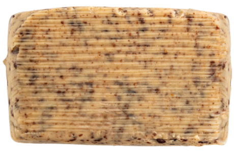 Rectangular bar of artisanal French butter with cocoa, ribbed texture, visible cocoa flecks