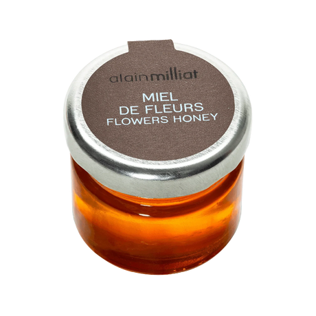 Alain Milliat Flowers Honey in glass jar, golden amber color, artisan-made premium French honey