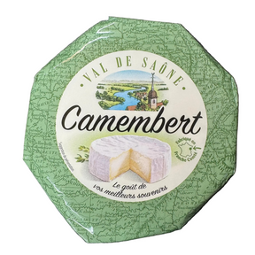 Camembert cheese packaging with green lid on a dark background