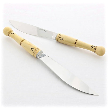 Nontron cheese knives with boxwood handles and stainless steel blades on white background