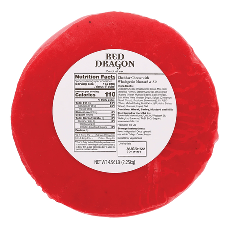 Red Dragon cheddar cheese wheel in red wax with ingredient and nutrition label, premium import