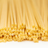 Mancini Chitarra pasta close-up, square-cut strands, semolina and water only