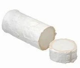 Artisan French cheese wheel with creamy white rind, sliced for serving