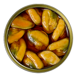 Gourmet mussels in escabeche sauce in an open tin, premium French pantry seafood