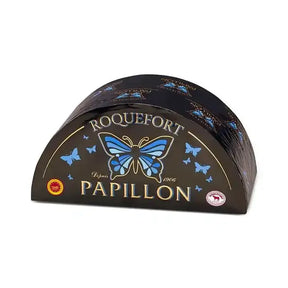 Papillon Roquefort blue cheese half-wheel with blue butterfly logo on black packaging