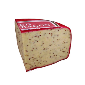 Red Dragon cheese wedge with speckled texture and red rind, artisanal gourmet cheese